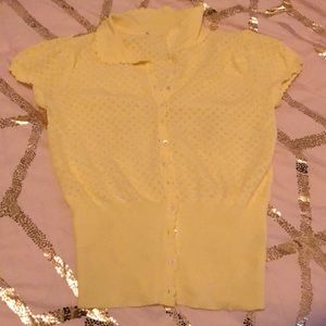 A button down yellow shirt